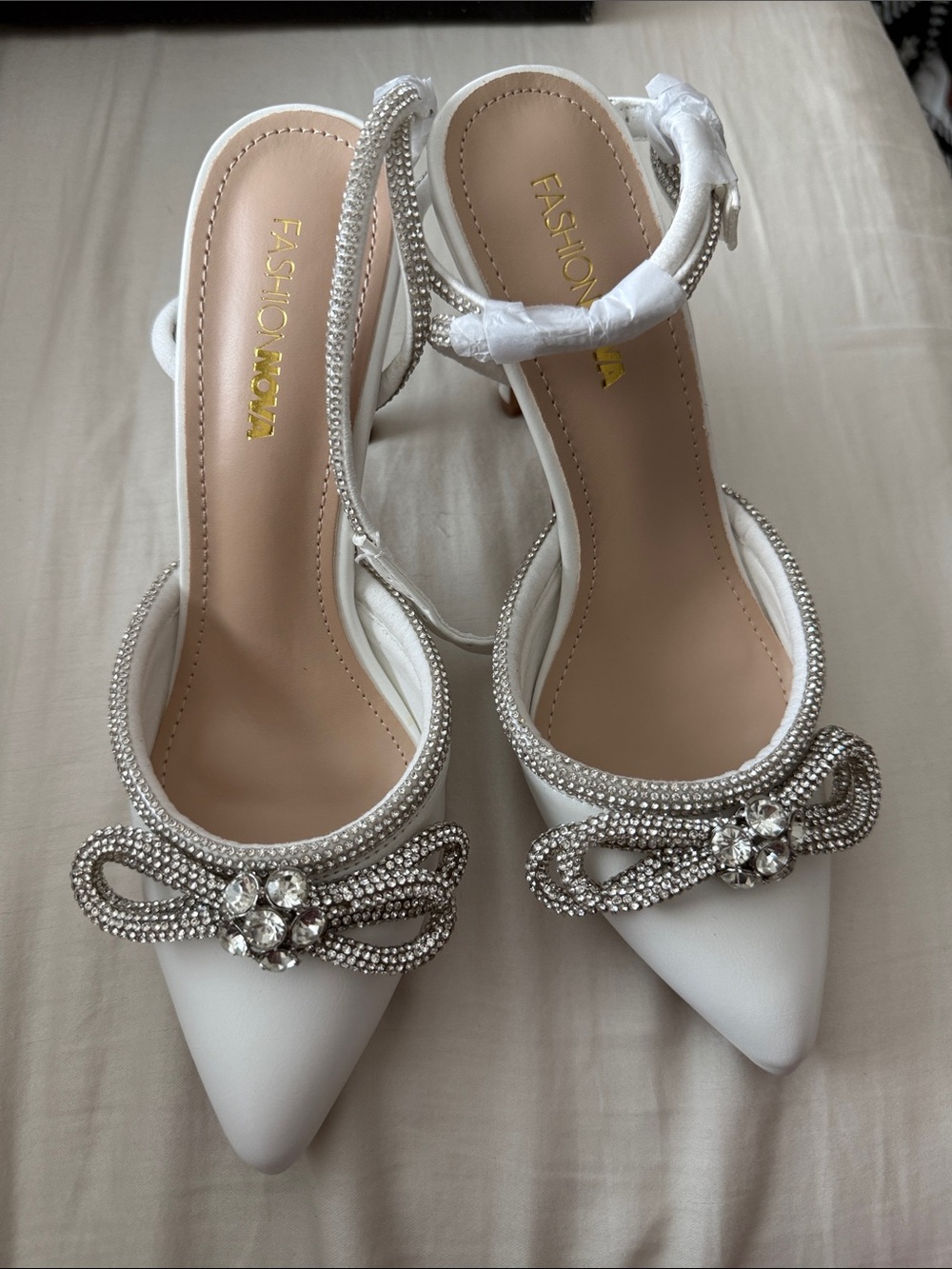 White Pointed Toe Heels with Crystal Bow
